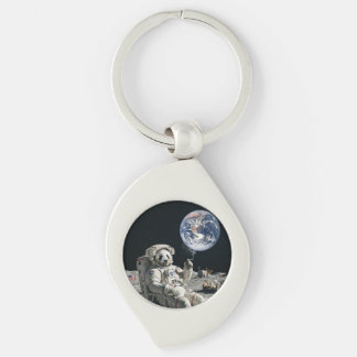 A panda smoking a cigarette on the moon keychain