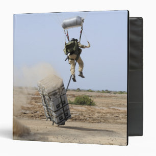 A pararescueman drops into the zone binder