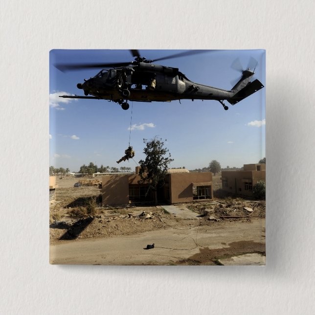 A pararescueman rappels from an HH-60 2 2 Inch Square Button (Front)