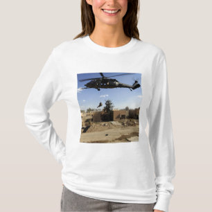 A pararescueman rappels from an HH-60 2 T-Shirt