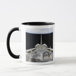 A partial view of Space Shuttle Mug
