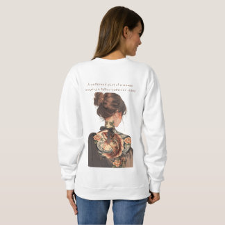 A patterned shirt of a woman wearing a tattoo-patt