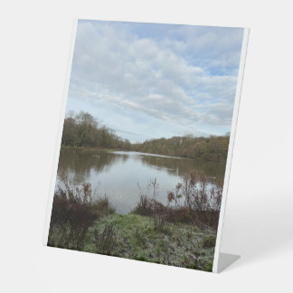A peacful lake.. pedestal sign