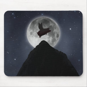 A pig flies across full moon over mountain peak mouse pad