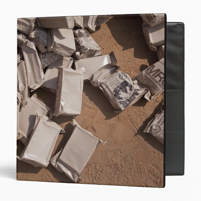 A pile of Meals Ready to Eat Binder (Front/Inside)