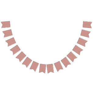 a pink and white background with a pattern bunting flags