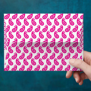 a pink and white background with a pattern envelope