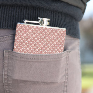 a pink and white background with a pattern hip flask