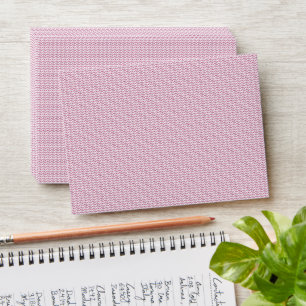 a pink and white background with wavy lines envelope