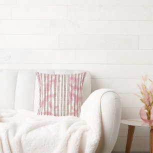 a pink and white striped background throw pillow