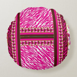 a pink and white wallpaper with a cross on it round pillow