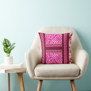 a pink and white wallpaper with a cross on it throw pillow