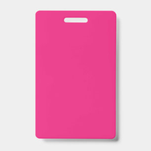 a pink background with a black border badge