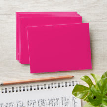 a pink background with a black