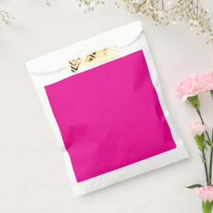 a pink background with a favour bag