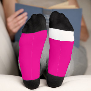 a pink background with a  socks