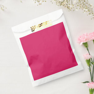 a pink background with a white border favour bag