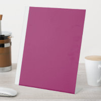 a pink background with a white border