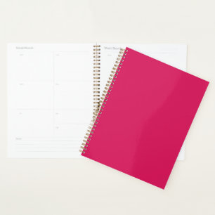 a pink background with a white border planner