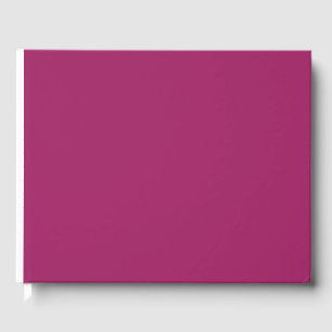 a pink background with a white guest book