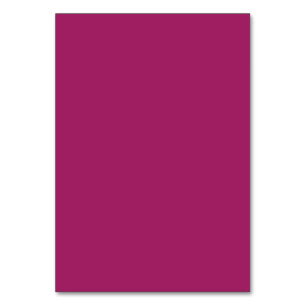 a pink background with a white table number