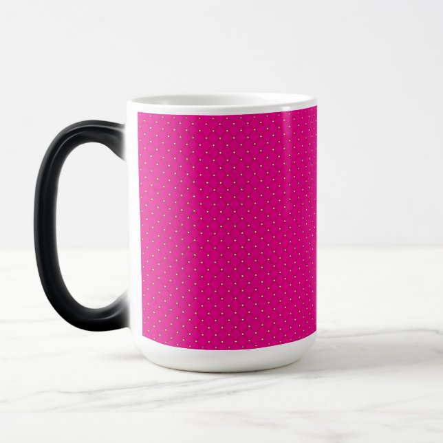 a pink background with white polka dots magic mug (Left)