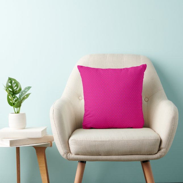 a pink background with white polka dots throw pillow (Chair)