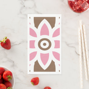 a pink flower on a brown background napkin