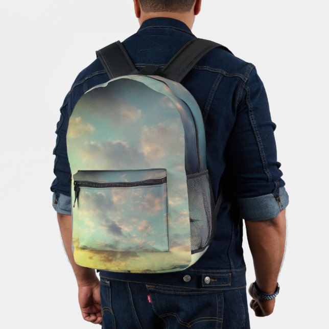 A pink to the clouds printed backpack (Insitu (Model))