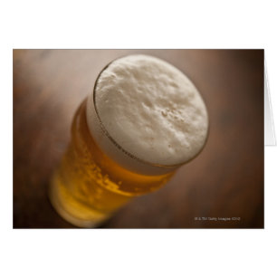 A pint of lager, back lir shallow focus rustic