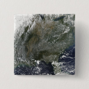 A pinwheel-like pattern of high pressure clouds 2 inch square button