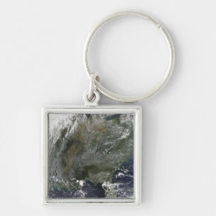 A pinwheel-like pattern of high pressure clouds keychain