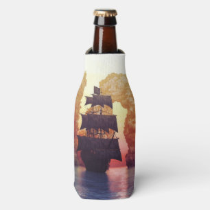 A pirate ship off an island at a sunset bottle cooler