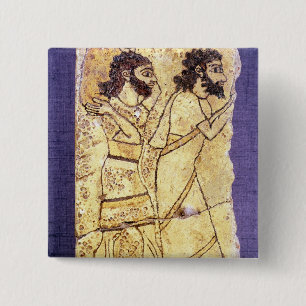 A plaque depicting two men walking 2 inch square button