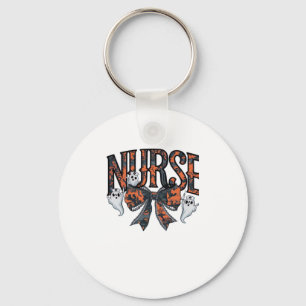 A playful design featuring a pumpkin witch with a  keychain