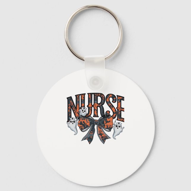 A playful design featuring a pumpkin witch with a  keychain (Front)