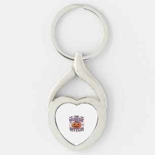 A playful design featuring a pumpkin witch with a  keychain