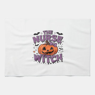 A playful design featuring a pumpkin witch with a  kitchen towel