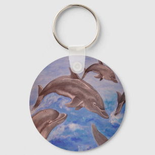 A Pod of Playful Jumping Dolphins Keychain