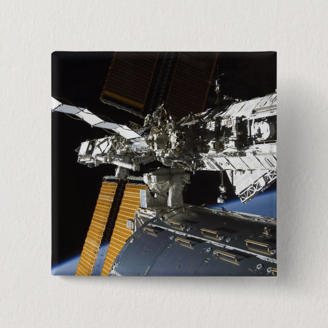 A portion of the Columbus laboratory 2 Inch Square Button (Front)