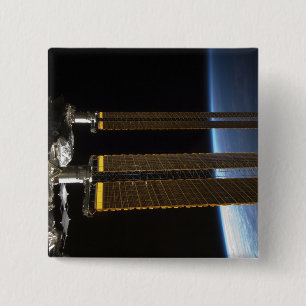 A portion of the International Space Station 2 Inch Square Button