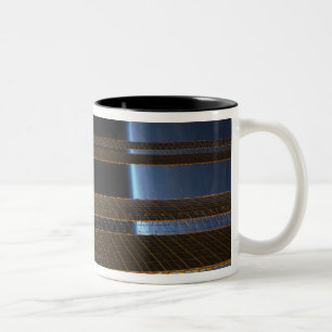 A portion of the International Space Station 2 Two-Tone Coffee Mug