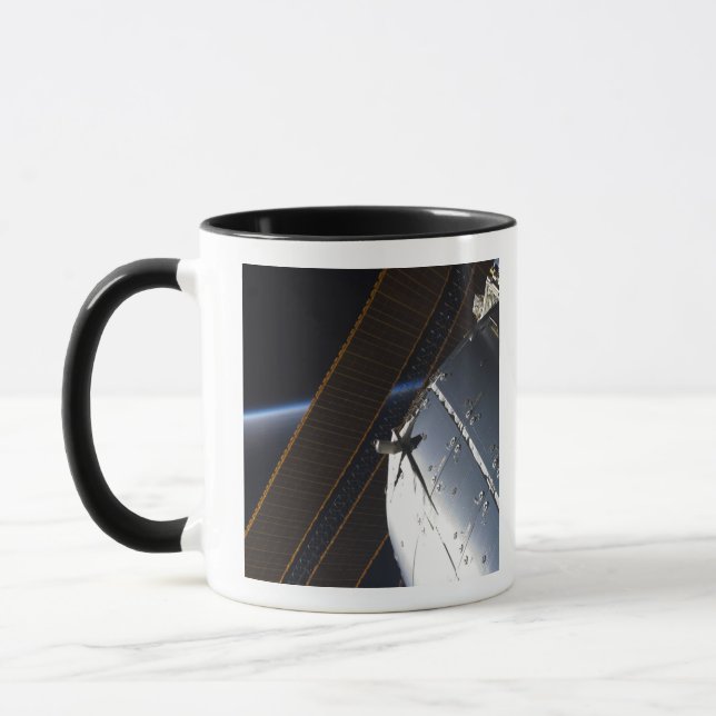 A portion of the International Space Station Mug (Left)