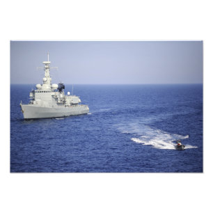 A Portuguese navy team in an inflatable boat Photo Print