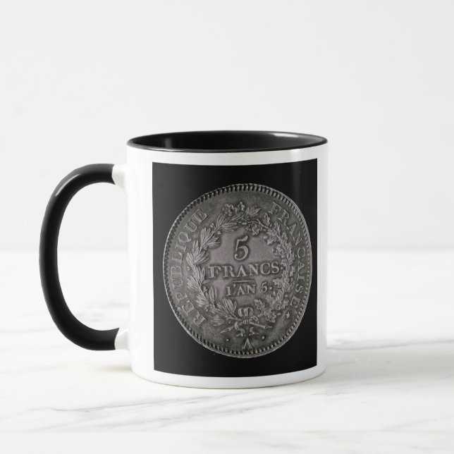A pound of twenty sols mug (Left)