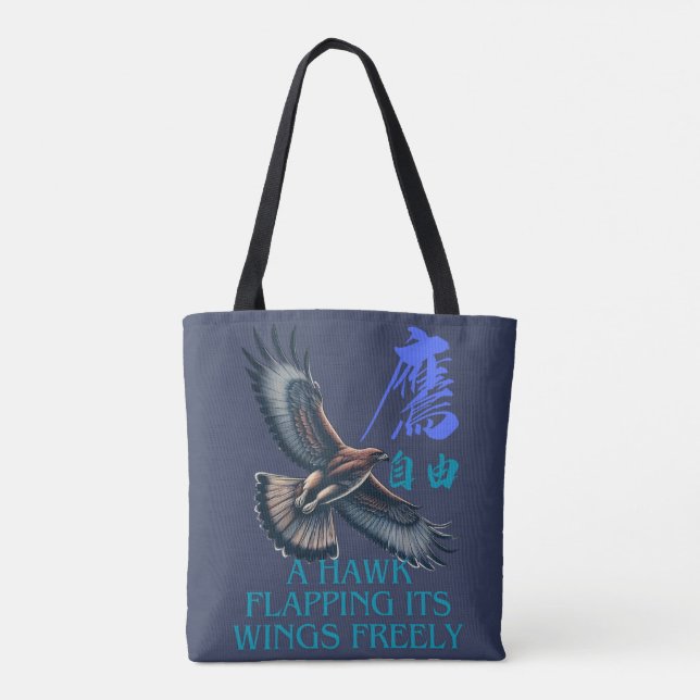 A powerful flying hawk symbolizing freedom tote bag (Back)