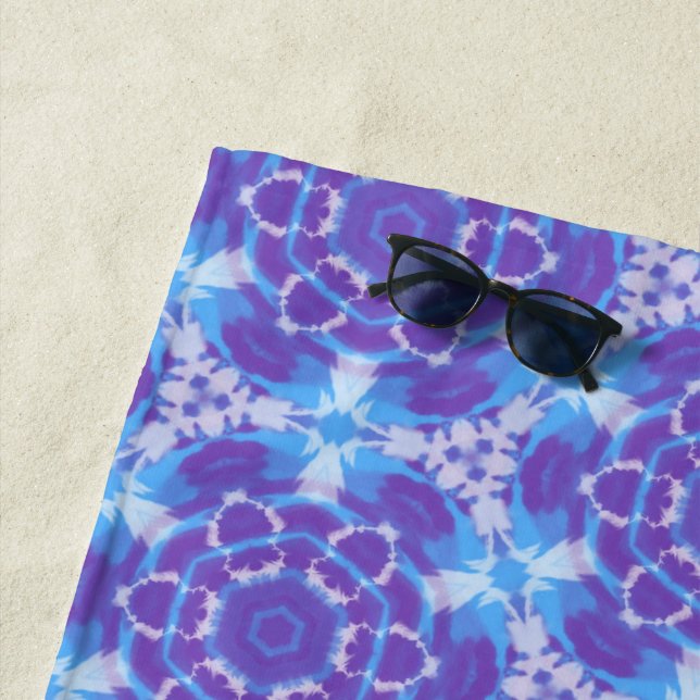 A Purple and Blue Tie Dye Pattern Beach Towel (In Situ)