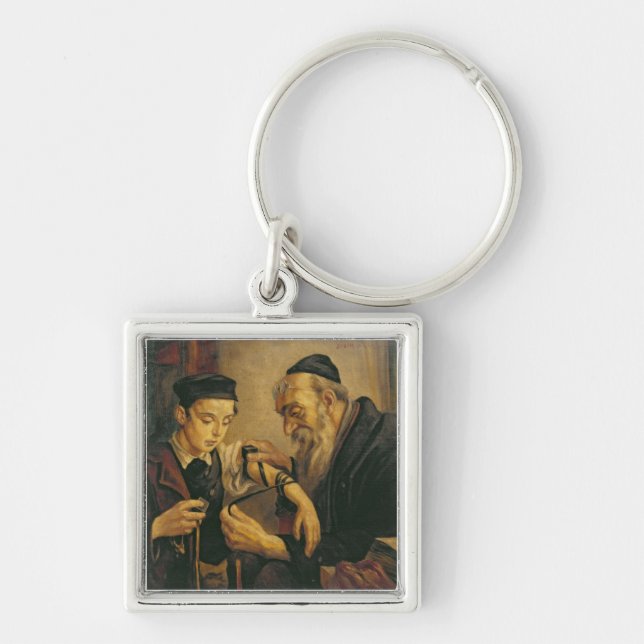A Rabbi tying the Phylacteries to the arm of a boy Keychain (Front)