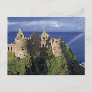 A rainbow strikes medieval Dunluce Castle on Postcard