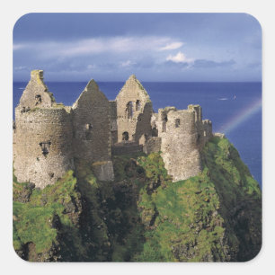 A rainbow strikes medieval Dunluce Castle on Square Sticker